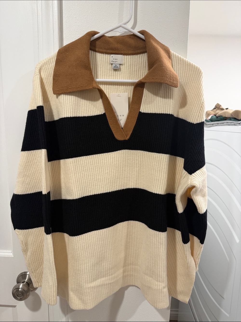 Women’s a New day Striped V-Neck Polo Sweater in Cream, Black & Brown.